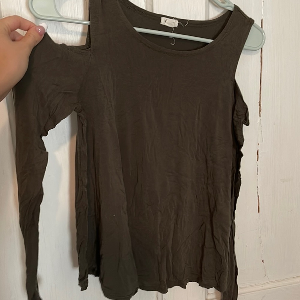 dark green long sleeve with cutout shoulder holes